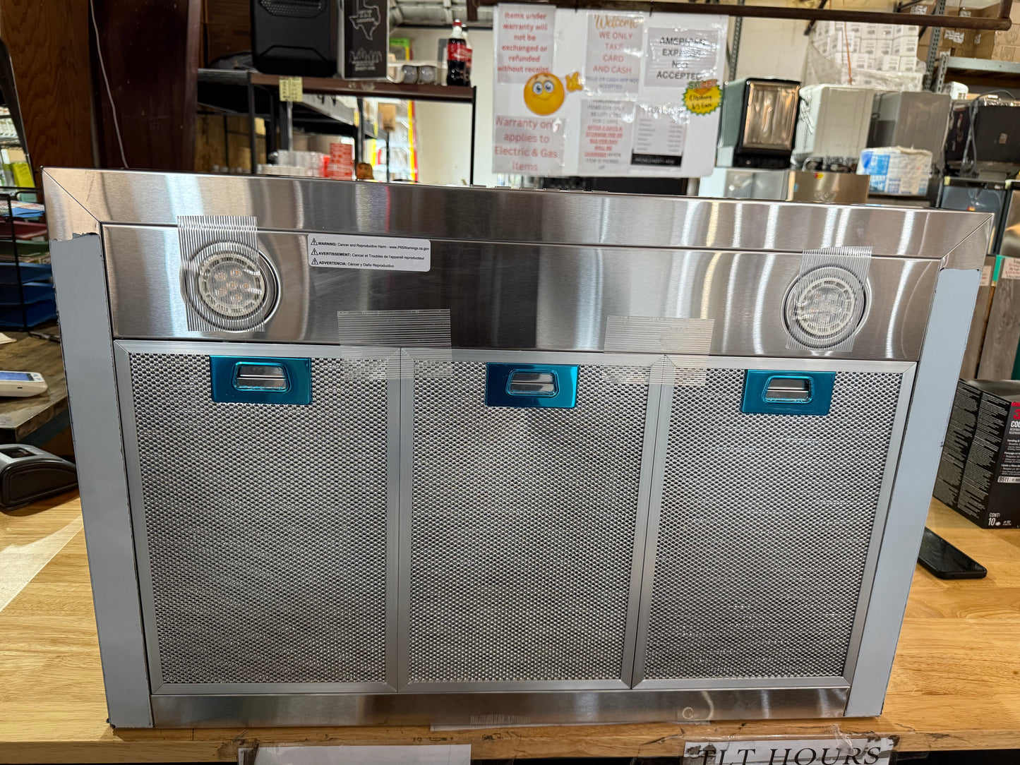 GE 30 inch Convertible 350-CFM Stainless Steel Wall-Mounted Range Hood with Charcoal Filter